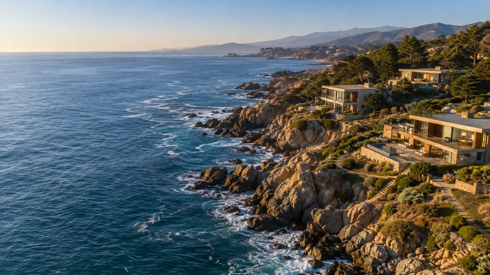 Luxury coastal homes on a cliff at sunset in Chile